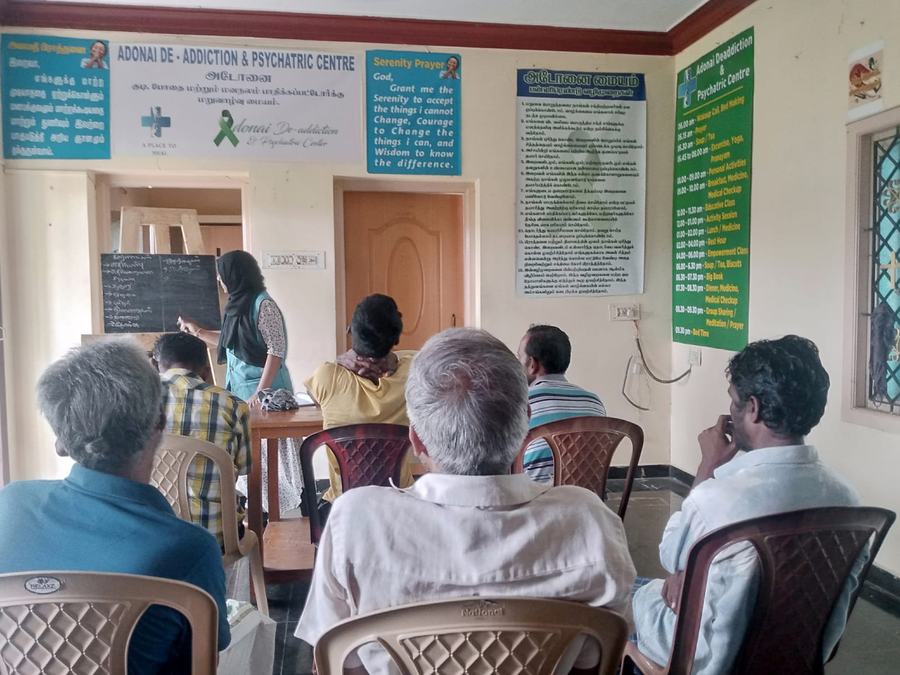 A counsellor leading a class session in the group room at the centre in Madurai